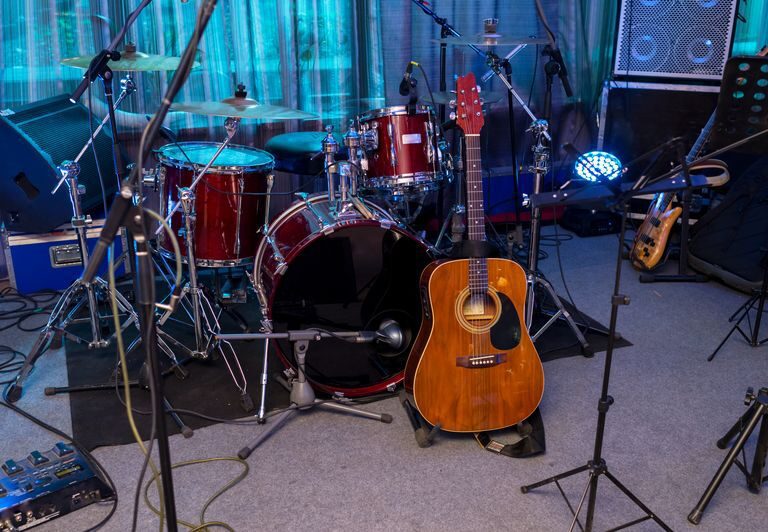 Drums and guitar on stage